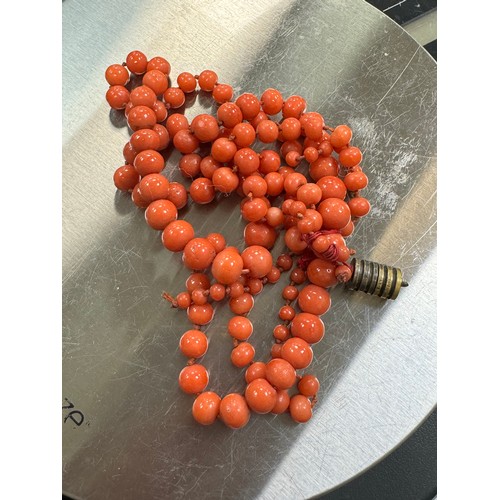 40 - Two graduated coral bead strands/ necklaces.  One strand, double knotted and 44cm in length The atta... 