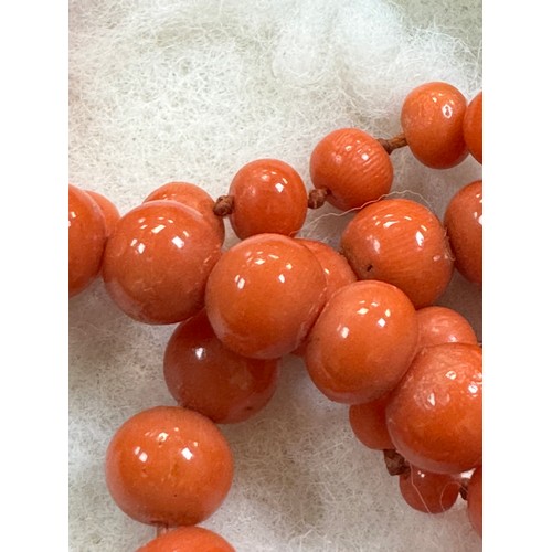 40 - Two graduated coral bead strands/ necklaces.  One strand, double knotted and 44cm in length The atta... 