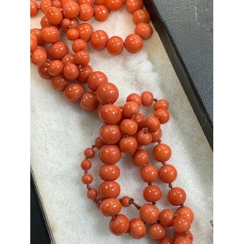 40 - Two graduated coral bead strands/ necklaces.  One strand, double knotted and 44cm in length The atta... 