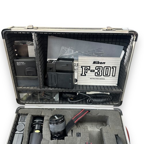 238A - Nikon F-301 Camera In Hardcase Box With Lenses & Accessories. Camera with attached Tamron 28-80mm f3... 