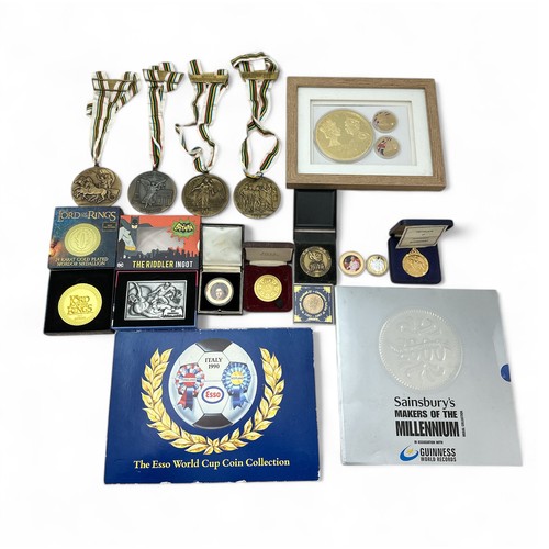 104 - A range of medallions etc, to include The Esso World Cup Coin Collection 1990 in presentation folder... 