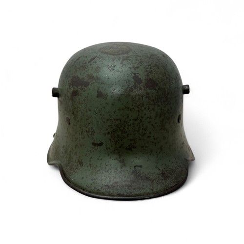 31 - German First World War M16 Si66 helmet shell, no liner, dull green paint 60% complete, stamped to si... 