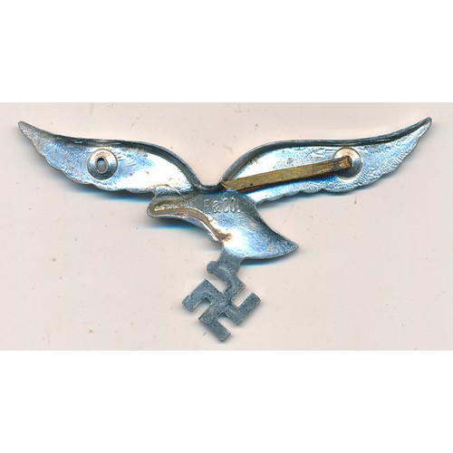 35 - Luftwaffe eagle cap badge, F.&CO moulded to reverse, missing 1 fixing pin, otherwise good very fine.