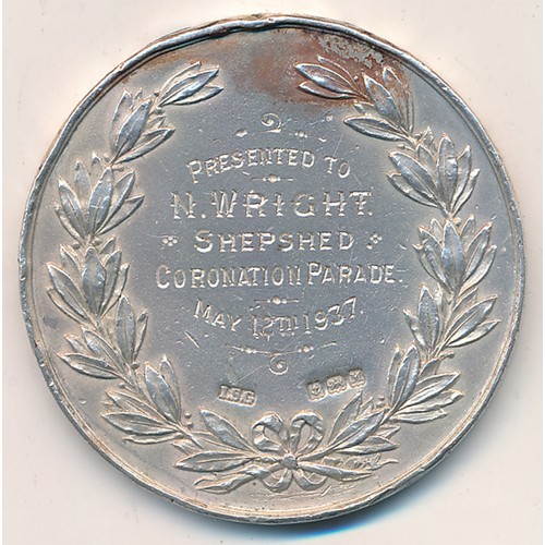 110 - 1937 silver prize medal weighing 41g depicting two horses to front, reverse engraved “Presented to N... 