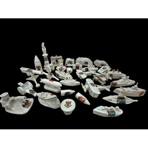 63 - A large quantity of Crested Ware including several military pieces and two boxes of other crested wa... 