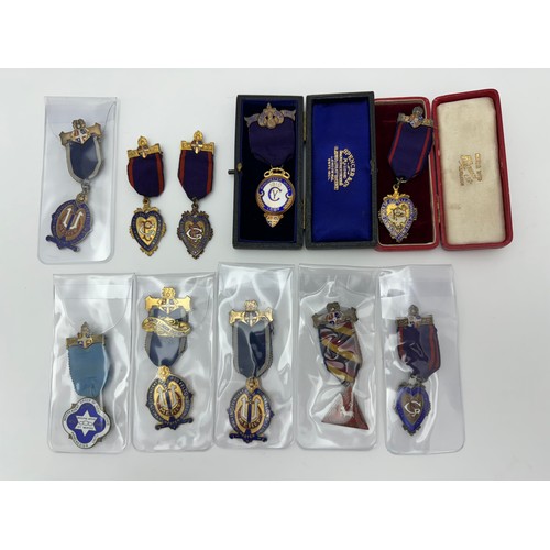 91 - A range of ten Manchester Unity Oddfellows jewels - six in silver/ silver gilt, four unmarked. Two b... 