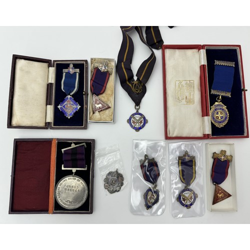 92 - A range of nine Oddfellows jewels/ medallions. Includes seven silver / silver gilt and enamel jewels... 