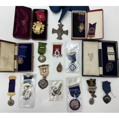 102 - An assortment of Masonic, friendly societies and other silver and enamel medals and jewels including... 