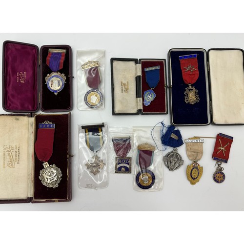 99 - A collection of eleven silver Masonic, Friendly Societies medals, badges etc. To include: A Hall Sto... 