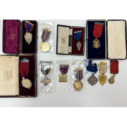 99 - A collection of eleven silver Masonic, Friendly Societies medals, badges etc. To include: A Hall Sto... 