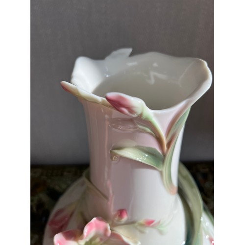 291 - Franz Porcelain, large stylized flower vase by Franz Porcelain. Stamped to base. Height 30cm.