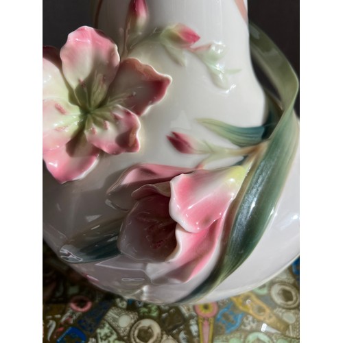 291 - Franz Porcelain, large stylized flower vase by Franz Porcelain. Stamped to base. Height 30cm.