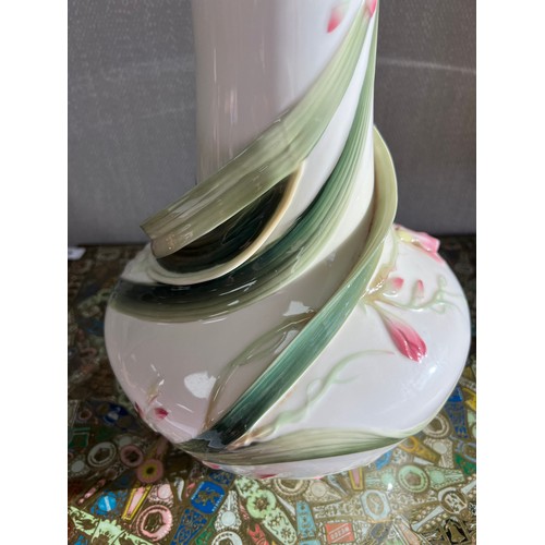 291 - Franz Porcelain, large stylized flower vase by Franz Porcelain. Stamped to base. Height 30cm.