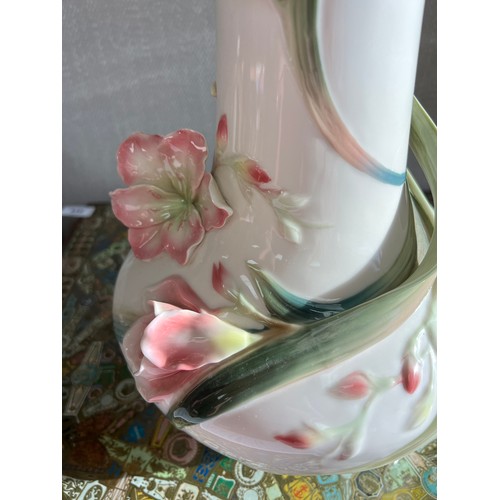 291 - Franz Porcelain, large stylized flower vase by Franz Porcelain. Stamped to base. Height 30cm.