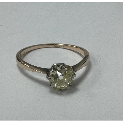 25 - An old mine cut fancy light yellow (estimated) diamond ring, size O. Set in unmarked gold.  Clarity ... 