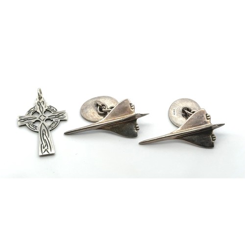 67 - A pair of hallmarked silver Links of London Concorde cufflinks and a silver cross pendant.