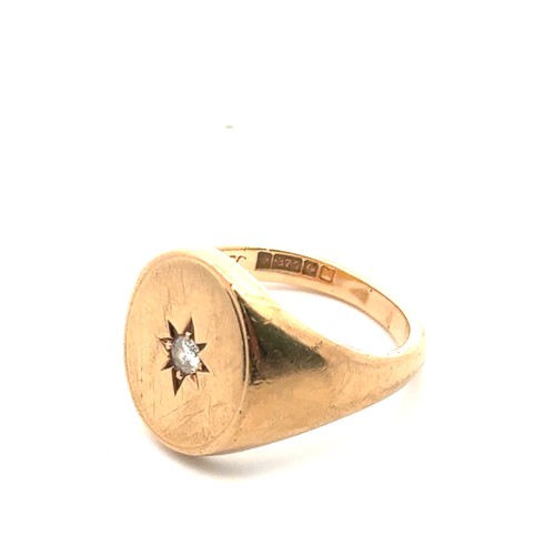 18 - A gypsy set diamond oval signet ring mounted in 9ct gold. Diamond approx 0.1ct. Size R.