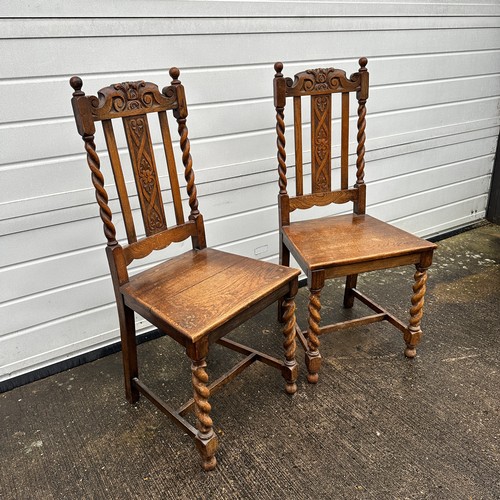 442 - Pair of carved oak hall chairs with barley twist supports and front legs. Height 107cm, width 48cm, ... 