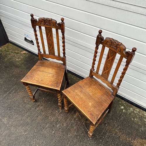 442 - Pair of carved oak hall chairs with barley twist supports and front legs. Height 107cm, width 48cm, ... 