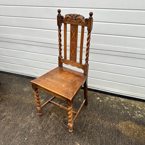 442 - Pair of carved oak hall chairs with barley twist supports and front legs. Height 107cm, width 48cm, ... 