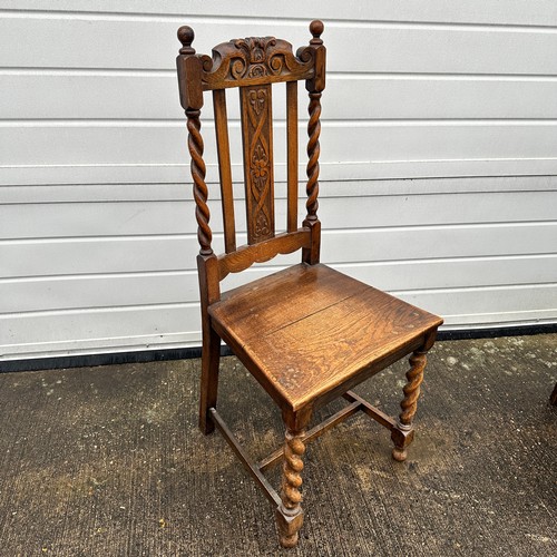 442 - Pair of carved oak hall chairs with barley twist supports and front legs. Height 107cm, width 48cm, ... 