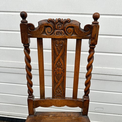 442 - Pair of carved oak hall chairs with barley twist supports and front legs. Height 107cm, width 48cm, ... 