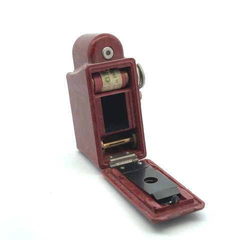 173 - Coronet Midget 16mm miniature or spy camera, with red body. In original leather case.