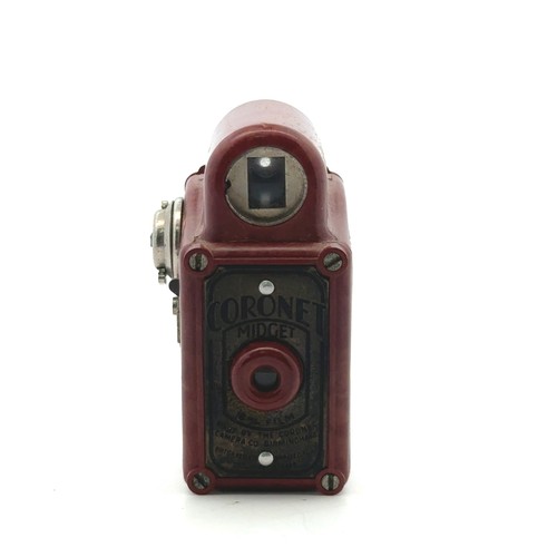 173 - Coronet Midget 16mm miniature or spy camera, with red body. In original leather case.