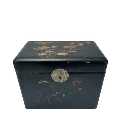 299 - A Japanese black lacquer tea caddy with hand painted bird and flower decoration.