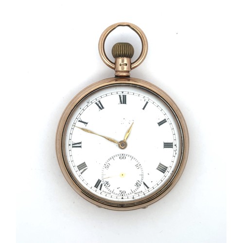 87 - A 9ct gold 15 jewel open face pocket watch with white enamel dial and Roman numeral hour markers. Sw... 