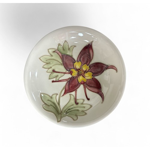 242 - William Moorcroft, shallow bowl for Moorcroft with cream ground and floral design. Impressed to base... 