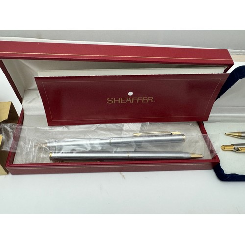 175 - A range of pens including a boxed Parker fountain pen, a boxed Sheaffer pencil and roller ball pen, ... 