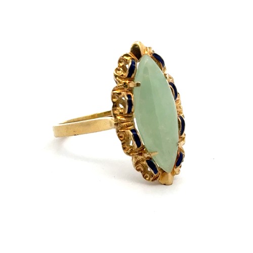 3 - A marquise jade set in a ring stamped 750 with blue enamel decoration. Size L. 4.75g