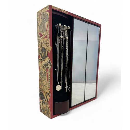 80 - A mirrored jewellery display case containing 13 silver pendant necklaces