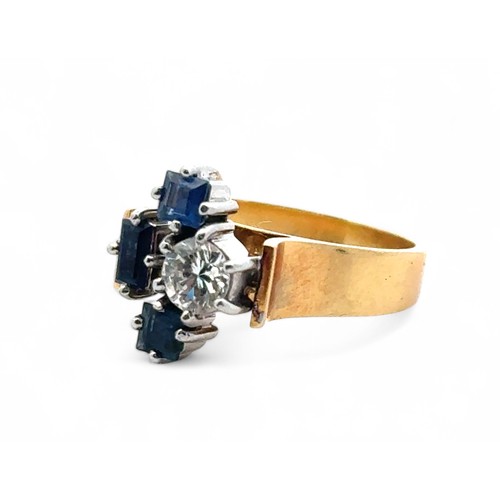 44 - An unusual sapphire and diamond ring, size L. Stamped 18ct. Diamond approx 0.5ct. Weight 6.0g.