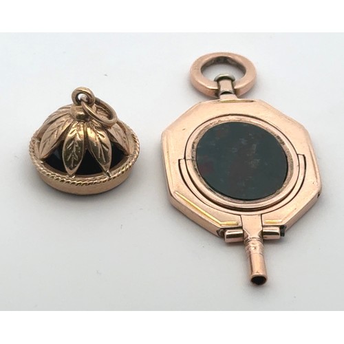 36 - A 9ct gold fob set with a bloodstone, sponsor GR, hallmarks partially rubbed and unclear, 4.85g. And... 