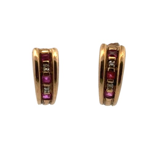 61 - A pair of ruby and diamond C hoop earrings in unmarked gold (tests as 9ct using XRF).