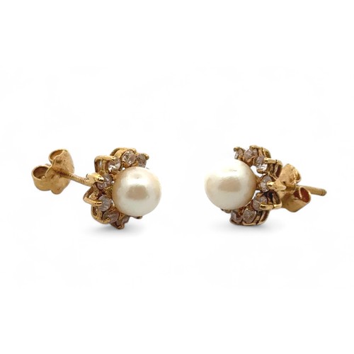 24 - A pair of pearl and CZ earrings in yellow gold, tests as 18ct using XRF. 5.03g