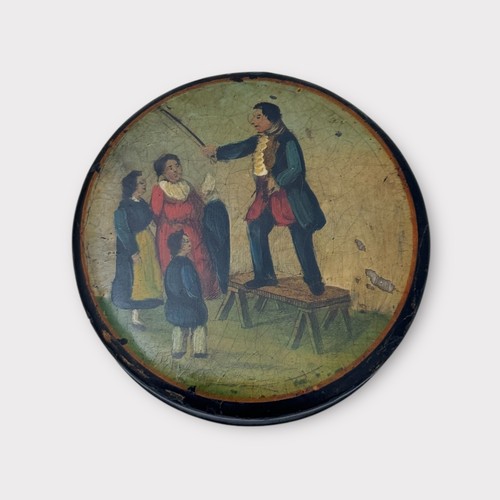 251 - 19th Century papier-mâché hand painted snuff box with man playing violin painted to lid. Diameter 8c... 