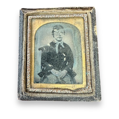 373 - 19th Century pair of framed daguerreotype photographs, one of a lady one of a boy. Gilt border, lady... 