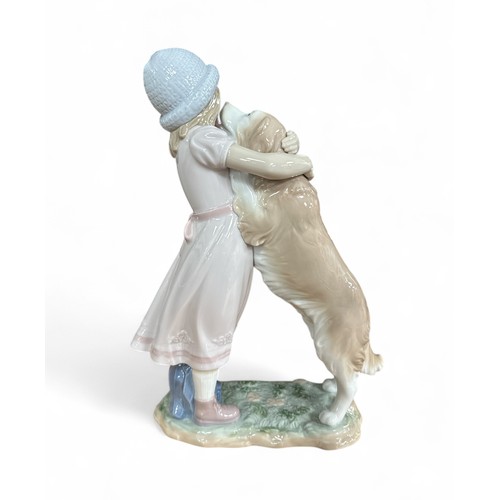 240 - Lladro, A Warm Welcome 6903 figurine. Height 25cm.