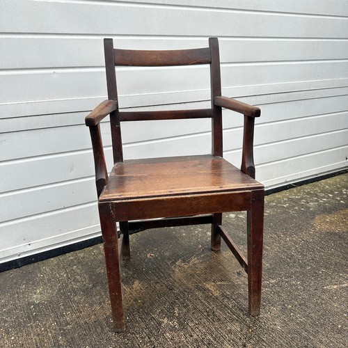 441 - Welsh Oak Armchair. With panelled seat. 90cm height x 53cm width x 42cm depth. BUYER TO COLLECT OR A... 