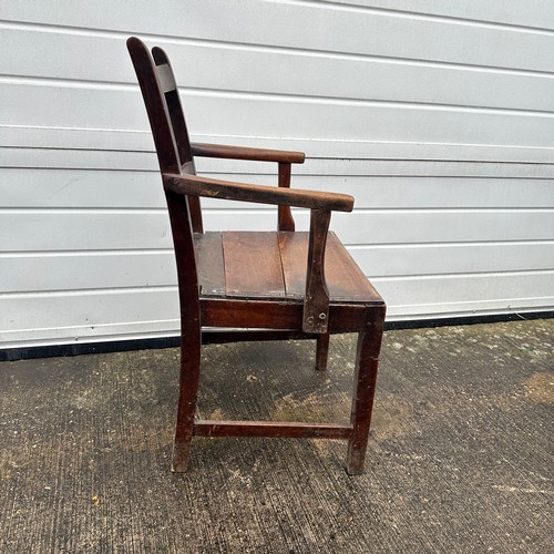 441 - Welsh Oak Armchair. With panelled seat. 90cm height x 53cm width x 42cm depth. BUYER TO COLLECT OR A... 