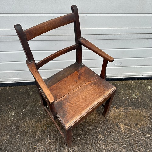 441 - Welsh Oak Armchair. With panelled seat. 90cm height x 53cm width x 42cm depth. BUYER TO COLLECT OR A... 