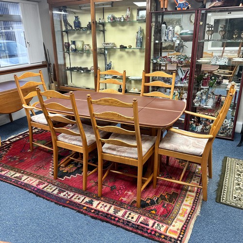 427 - Ercol – Southwold – an Ercol Southwold Dining Set including table, four dining chairs and two carver... 