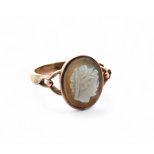 23 - A vintage rose gold ring set with shell cameo and carved woman in profile, size M.