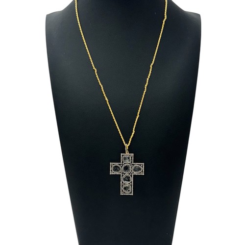 55 - An unusual silver-gilt cross set with slice-cut and rose-cut diamonds on a silver rope link chain. D... 