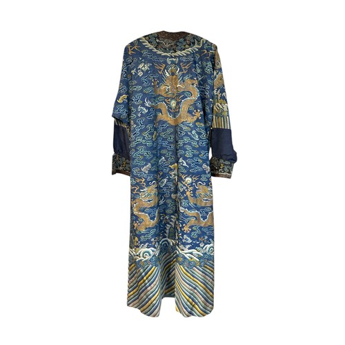 296 - Chinese Late 19th / Early 20th Century silk blue ground Dragon robe with gold thread. Finely embroid... 