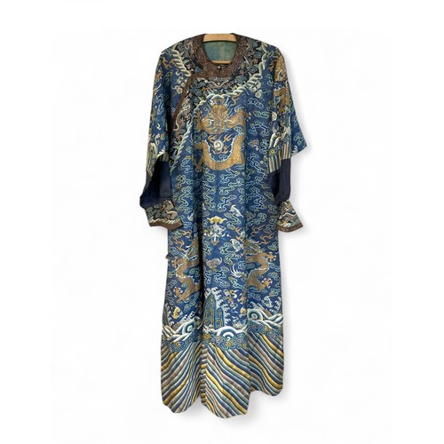 296 - Chinese Late 19th / Early 20th Century silk blue ground Dragon robe with gold thread. Finely embroid... 