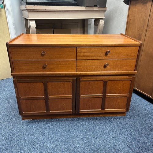 423 - Nathan - Squares Pattern - A retro 20th Century teak sideboard credenza. Having four drawers with a ... 